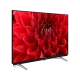 Arçelik A50 C 865 B Ultra HD 4K TV, kırmızı çiçek görüntüsü ve ayaklı siyah LED ekran