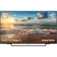 Grundig Madrid 50 GJQ 9250 Ultra HD 4K LED televizyon, sahil manzarası gösteren siyah ekran tasarımı