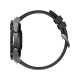 Huawei Watch Ultimate siyah aktivite saati, yan profilden görünen yuvarlak kasa ve silikon kayış.