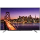 Grundig 65 VLX 7730 SP Ultra HD 4K LED TV, köprü ve şehir manzarası gösteren geniş ekranlı televizyon