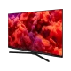 Arçelik A55 A 965 B Ultra HD 4K LED televizyon, canlı kırmızı ve mor ekranıyla önden görünür.