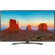 Vestel 65FA7550 Full HD FHD TV, siyah çerçeveli ekranında etkileyici çöl manzarası gösteriliyor