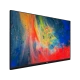Vestel 55UG9630 Ultra HD 4K LED televizyon, renkli ekran görüntüsüyle üç çeyrek açıdan görünür