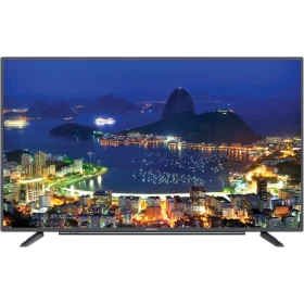Grundig Rio 40 CLX 7745 AP Ultra HD 4K LED TV, gece şehir manzarası gösteren siyah televizyon