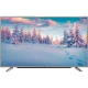 Beko B40L 8752 5S Ultra HD 4K TV, ince çerçeveli siyah televizyon ve karlı orman manzarası