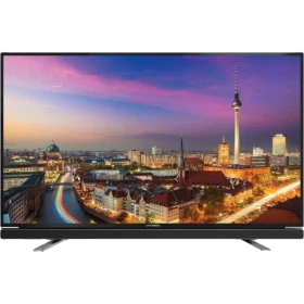 Grundig 43 VLE 6535 BL Full HD LED televizyon, siyah çerçeveli ekranda şehir manzarası gösteriyor