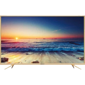 Sunny SN65LEDA71 Ultra HD 4K TV, altın çerçeveli ekranında gün batımlı plaj görüntüsü ve ayaklı tasarım