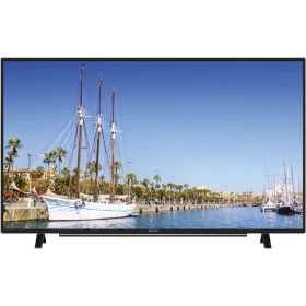Arçelik A32L 6760 5B Full HD LED TV ekranında yat limanı, tekneler ve palmiye ağaçları görüntüleniyor