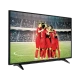 Arçelik A49L 8740 5B Ultra HD 4K LED televizyon, futbol maçında kenetlenen kırmızı formalı oyuncuları gösteriyor