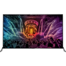 Philips 65PUS6121 Ultra HD 4K LED televizyon ekranında renkli konser sahnesi görünüyor.