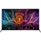 Philips 65PUS6121 Ultra HD 4K LED televizyon ekranında renkli konser sahnesi görünüyor.