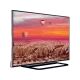 Vestel 40FA8100 Full HD LED TV, gün batımı manzarası gösteren siyah çerçeveli televizyon