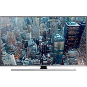 Samsung 55JU7000 Ultra HD 4K TV vitrinde şehir manzarası ekranıyla, genel renkli televizyon