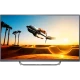 Philips 65PUS7502 65 inç Ultra HD 4K LED televizyon; kavisli tasarımlı siyah ekranda motosiklet sahnesi