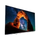 Philips 55OLED803 Ultra HD 4K OLED televizyon ekranında koyu renkli duvara yansıyan canlı içerik görüntüsü