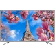 Sunny SN65LEDA51 Ultra HD 4K TV, ince çerçeveli tasarımda Eyfel Kulesi ve pembe çiçek manzarası gösteriyor