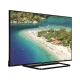 Vestel 50FA7500 Full HD LED televizyon, siyah çerçeveli ekranında turkuaz koy manzarası gösteriyor