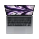 Apple MacBook Air M2 13.6 inç gri laptop, açık ekranlı üstten görünüm ve Türkçe klavye detaylı tasarım