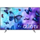 Samsung 55Q6FN Ultra HD 4K QLED TV, canlı kelebek temalı ekran ve ince ayaklı televizyon görünümü