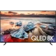 Samsung 82Q900R QLED Ultra HD 8K TV, okyanus ve taş manzaralı ekran, vitrinde genel siyah tasarım