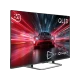 Beko B 955 C AI Ultra HD 4K TV, siyah çerçeveli QLED ekranında kırmızı spor otomobil görüntüsü