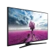 Vestel 50UD9180 Ultra HD 4K LED televizyon, siyah çerçevesi ve pembe ağaçlı manzara ekranıyla