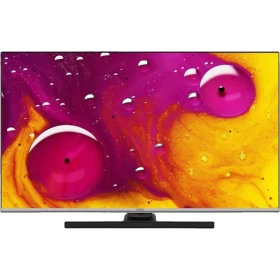 Vestel 43Q9700TT Ultra HD 4K QLED televizyon, siyah çerçevesiyle renkli soyut görüntü gösteriyor