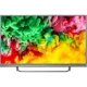 Philips 55PUS6803 Ultra HD 4K LED televizyon; canlı renkli çiçek ekranıyla ön görünüm, genel renk.