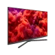 Arçelik A65 A 955 A Ultra HD 4K LED televizyon, yandan görünümde canlı renkli ekran ve siyah ayak kaplamasıyla