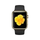 Apple Watch Edition 42 mm 18 ayar sarı altın kasalı, siyah spor kordonlu akıllı saat; ekranda sarı çiçek