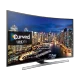 Samsung 55JU7500 Ultra HD 4K LED televizyon; şehir manzaralı ekranda Curved UHD TV yazısı görünen siyah tasarım