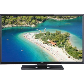 Vestel 32HA7100 HD Ready LED televizyon, sahil manzarası gösteren siyah ekran ve ayak tasarımıyla